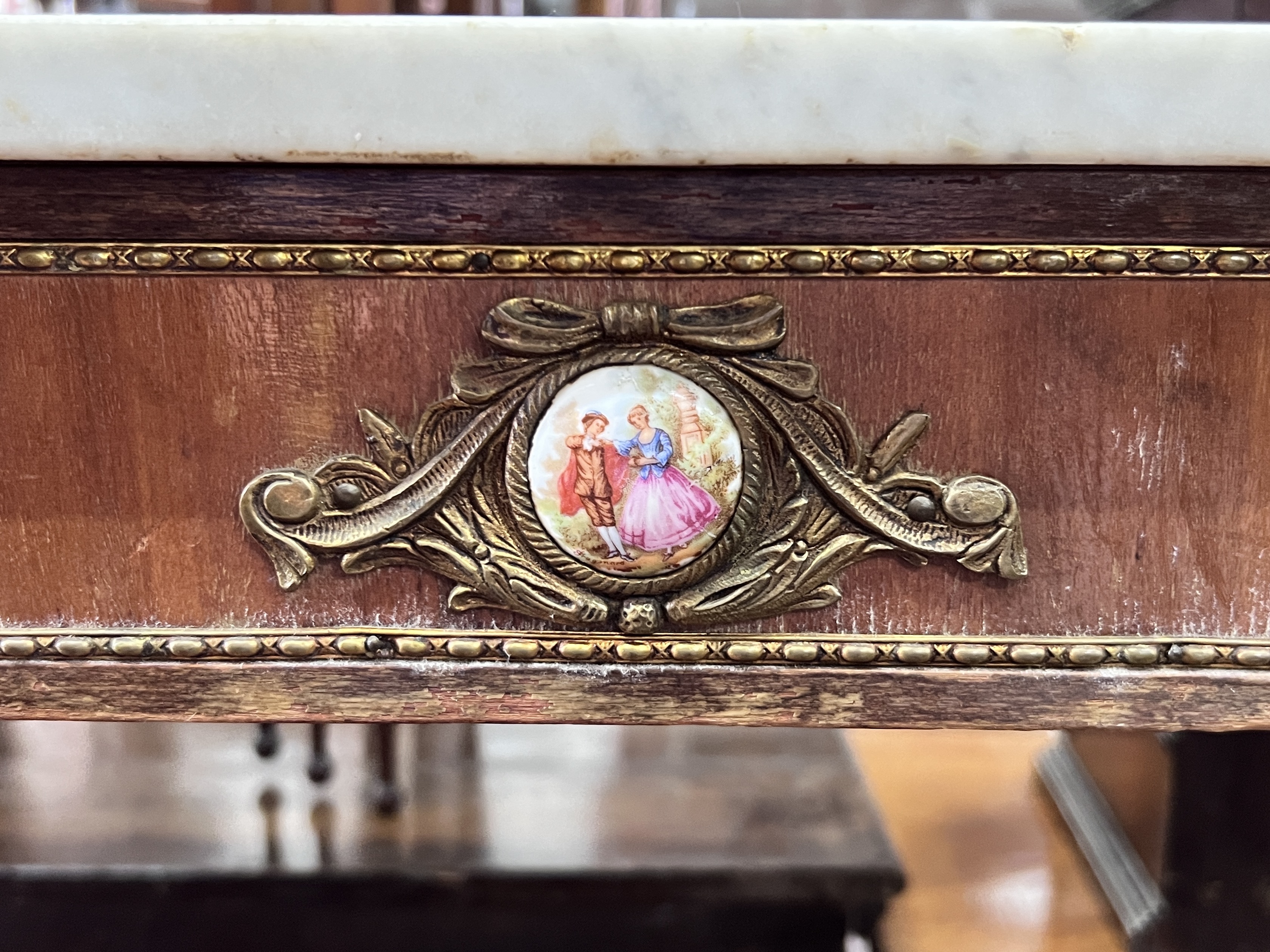 A French porcelain mounted rectangular marble top coffee table, width 68cm, depth 35cm, height 44cm together with a similar two tier plant stand and wall mirror